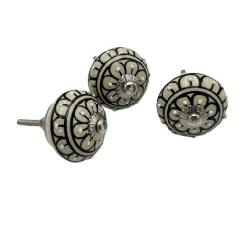 KNOB ROUND CREAM WITH BLACK LEAF FLOWER